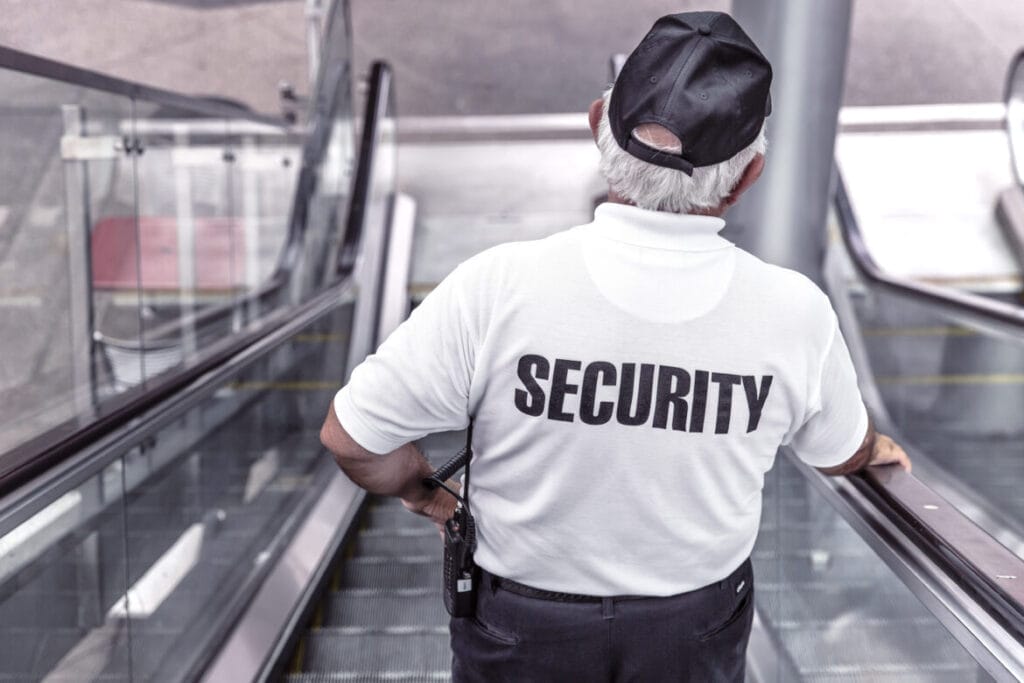 security guard on escalator