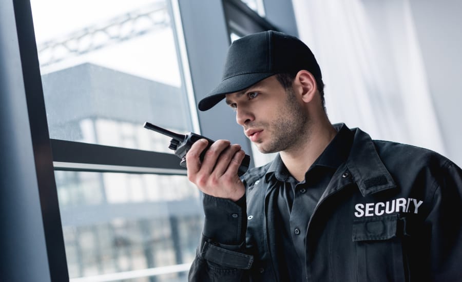 Security guard with a walkie-talkie