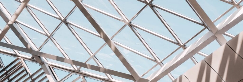 A close up of the glass ceiling in an indoor building.